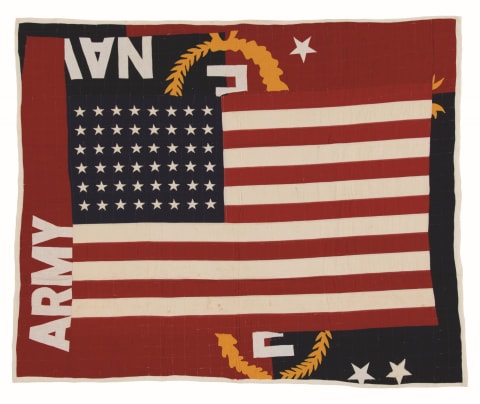 Flag Quilt photo showing an American flag with army and navy printed in the margins. 