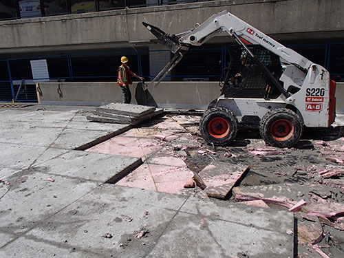 Old concrete slabs and insulation removed