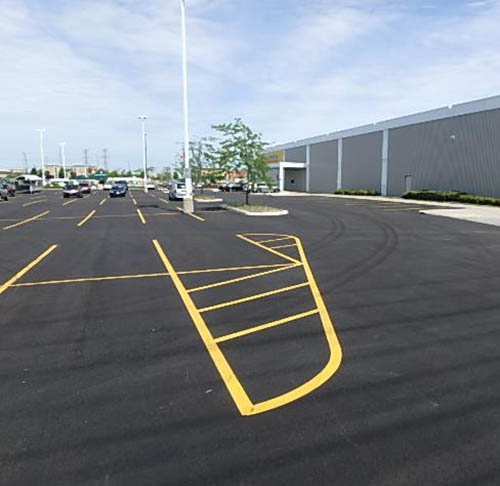 Concrete Island Removed to Accommodate Trucks Turning Radius