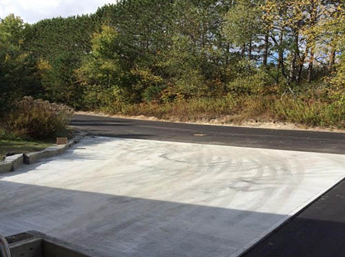 New Concrete Pad and Asphalt Pavement