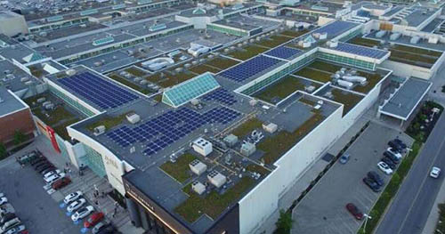 Aerial view of mall property showcasing different roof systems