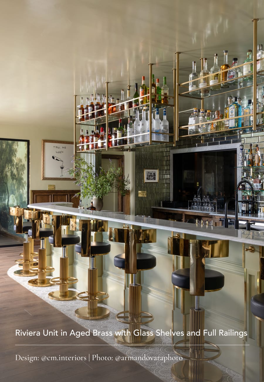 Riviera Unit in Aged Brass with Glass Shelves and Full Railings. Design: @cm.interiors | Photo: @armandovaraphoto