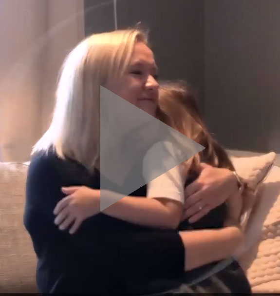 A still image from a video featuring a mother and child