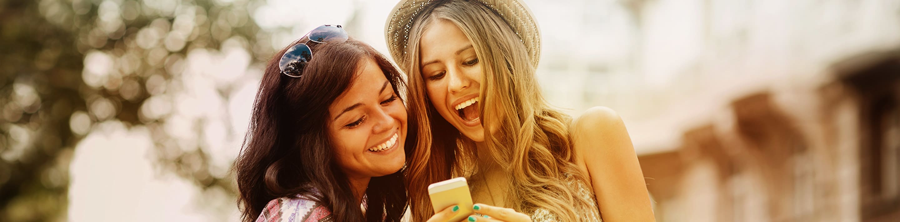 girls laughing in the phone 