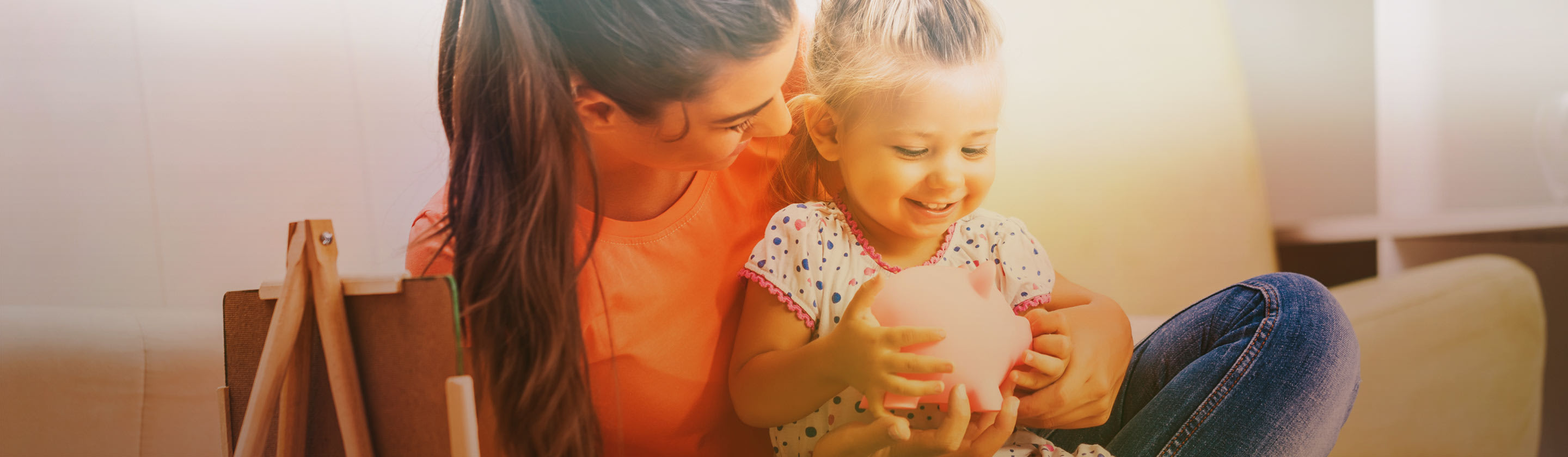 savings account mom and daughter with a savings bank