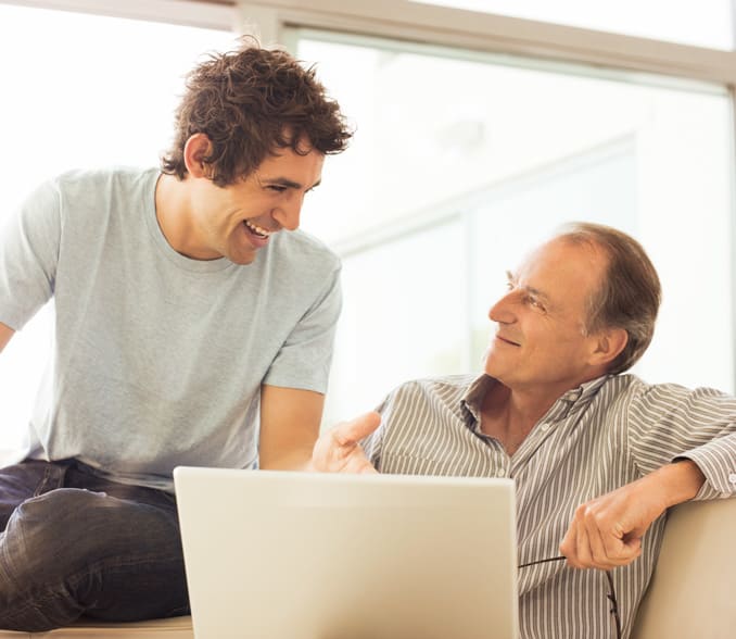 Moj Steber, father and son at the laptop