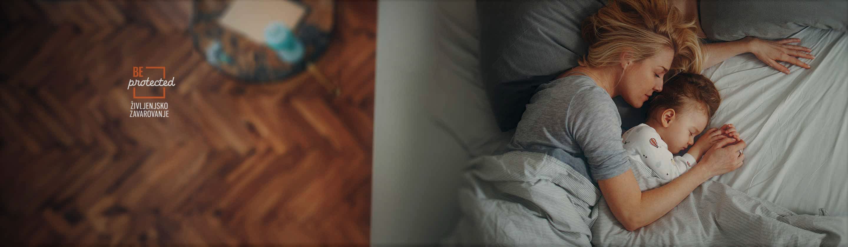 The image shows a mother and a child sleeping in a bed together.