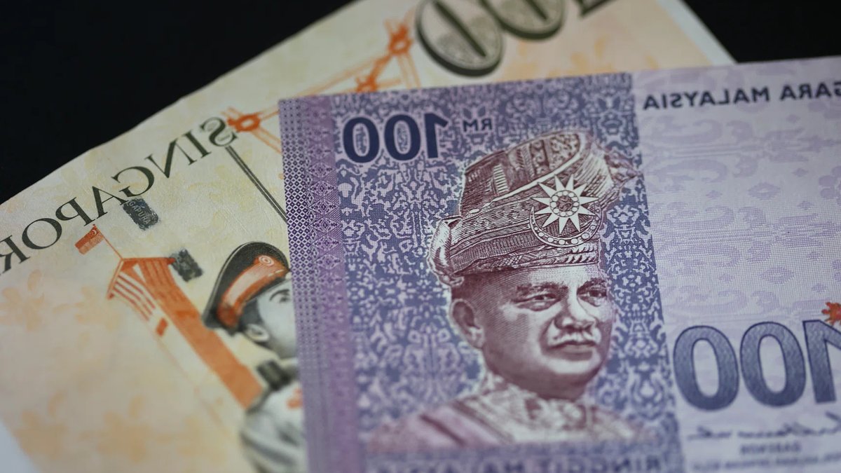 Ringgit climbs to 10-month peak against dollar - singapore ringgit