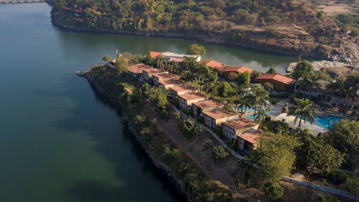 Architects rebuild flooded resort with river-inspired design