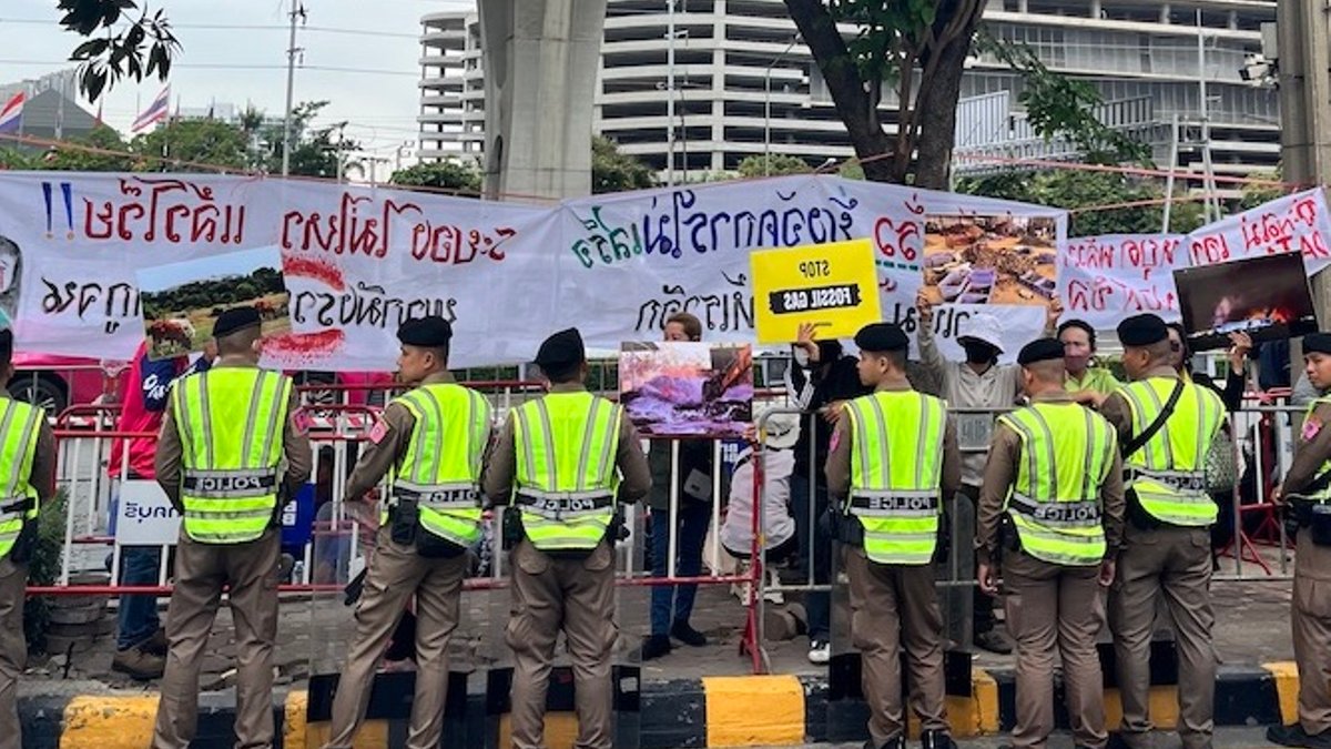 Bangkok Activists Demand Halt to Asian Gas Expansion Thai police monitor protesters massed outside the Gastech 2026 summit in Bangkok, Sept 14.