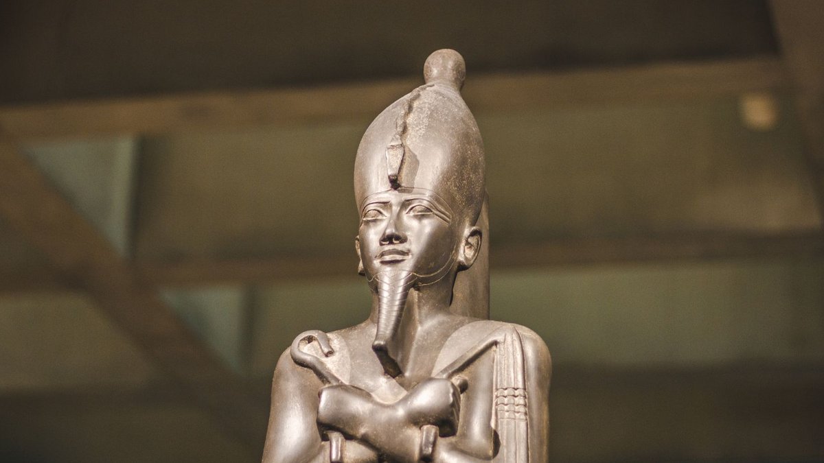 MNT Tech secures provisional EGX listing with deadline A detailed image of an ancient Egyptian statue displayed in a museum exhibit.