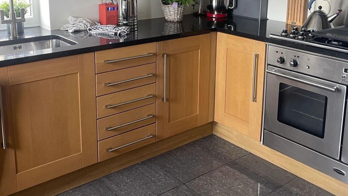 Instagram Creator Spray-Paints Oak Cabinets Off-Black - oak cabinets spray paint