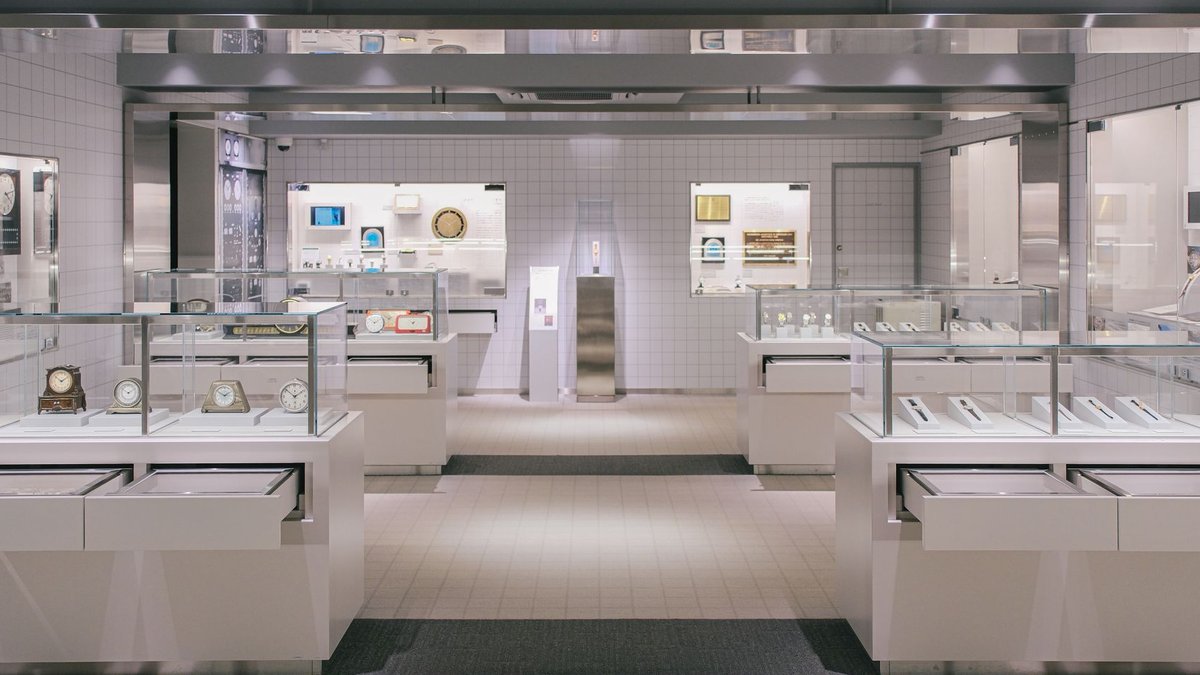Social Spaces Opens New Clerkenwell Showroom Luxurious watch showroom with elegant glass displays and modern design.