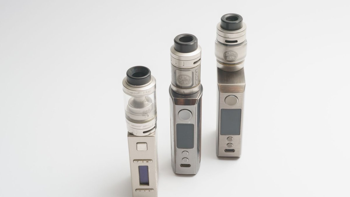 UK pushes for proper vape recycling amid disposal challenges Three sleek vape devices displayed on a clean white background, showcasing advanced technology and design.