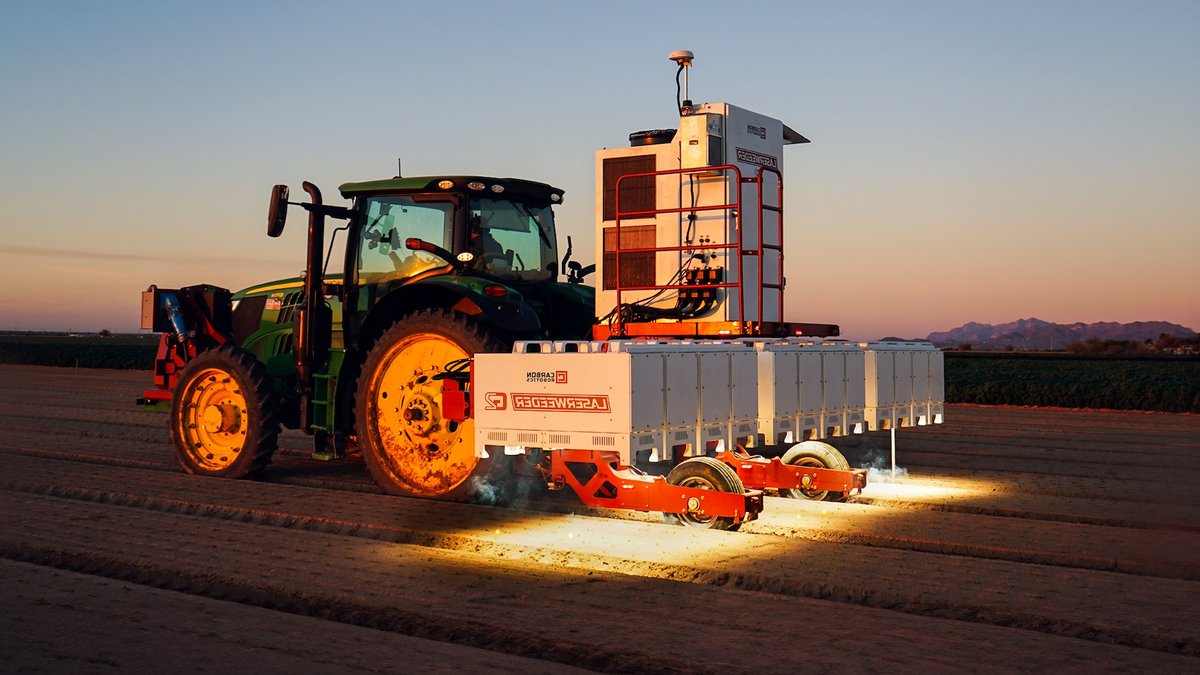The LaserWeeder G2 from Carbon Robotics is pulled behind a tractor to detect and zap weeds on a farm. (Carbon Robotics Photo)