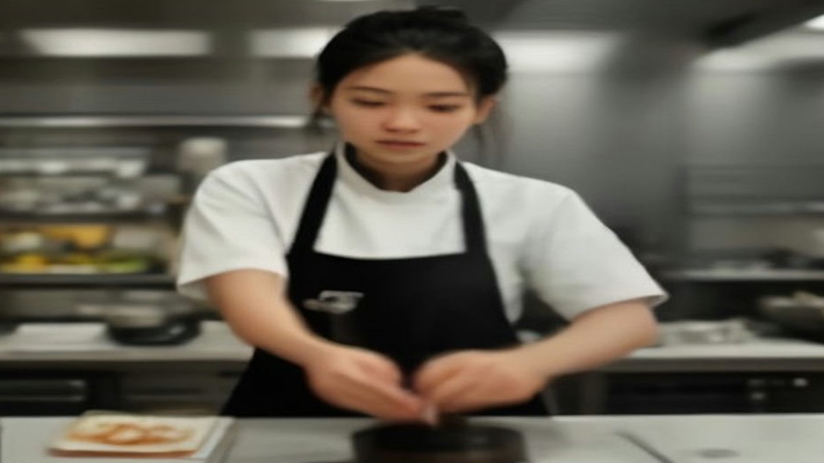 Restaurant kitchen staff at work.