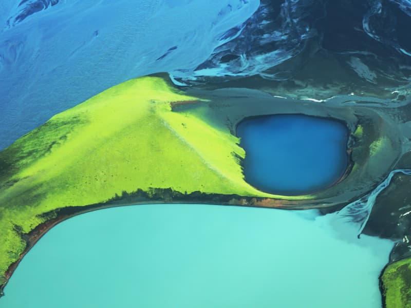 Aerial view of the highlands, rivers meeting lakes.
