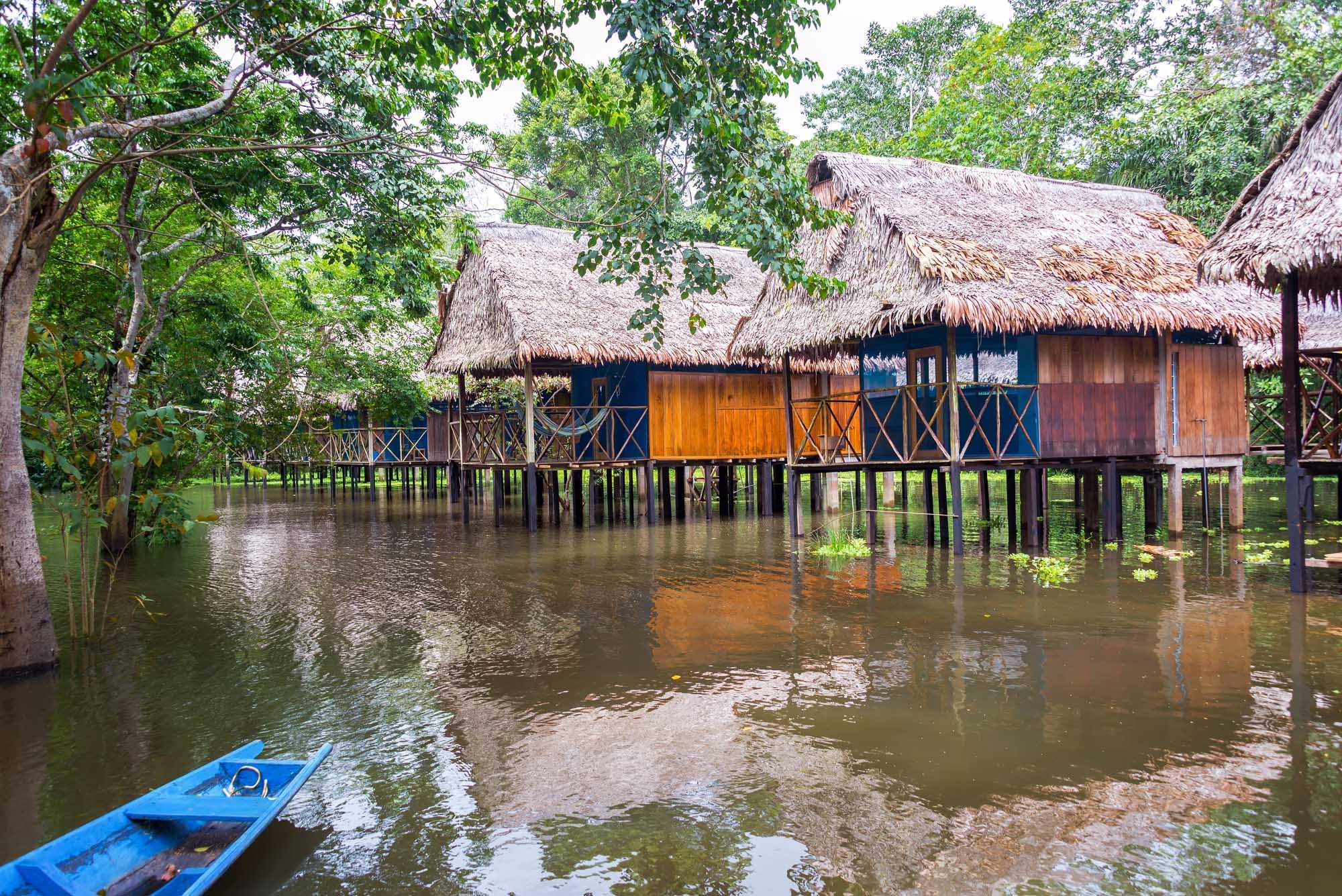 A picturesque collection of traditional wooden houses built on stilts over the Amazon River