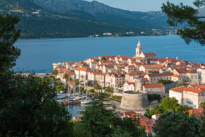 A picturesque medieval walled town on the Dalmatian coast of Croatia, featuring distinctive