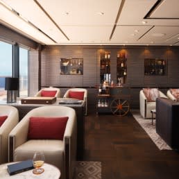An elegant and sophisticated onboard lounge aboard a luxury yacht, featuring rich wooden paneling