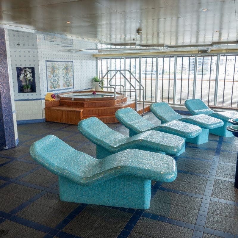 An indoor spa and wellness area aboard a Celestyal Cruises vessel, featuring turquoise mosaic-tiled