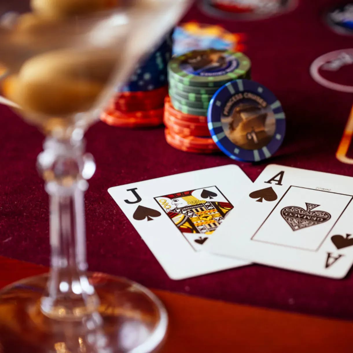 A sophisticated casino scene aboard a Princess Cruises ship featuring two players engaged in