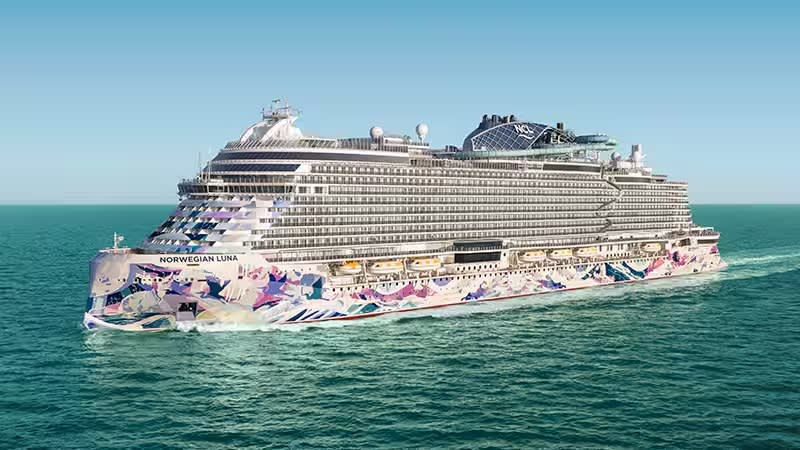 A large modern cruise ship identified as the Norwegian Luna, operated by Norwegian Cruise Line