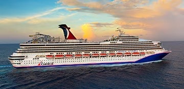 A large modern cruise ship with distinctive black funnel and white hull sails through calm ocean