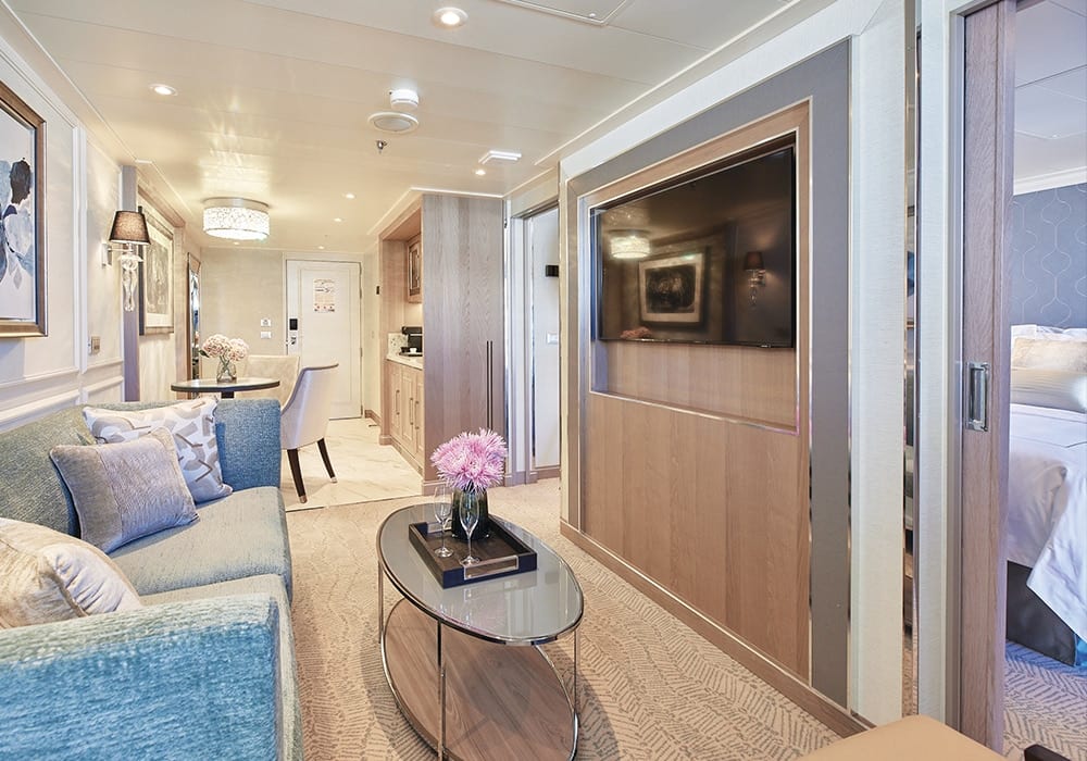 A luxurious penthouse suite aboard Regent Seven Seas Cruises featuring an elegant living area