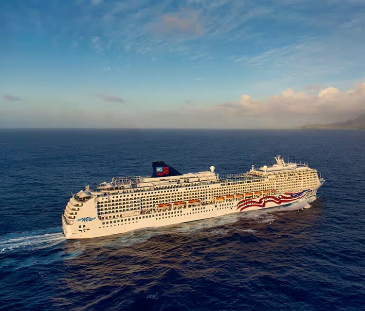 An aerial photograph of the Pride of America cruise ship anchored off Nawilwili, Kauai, Hawaii