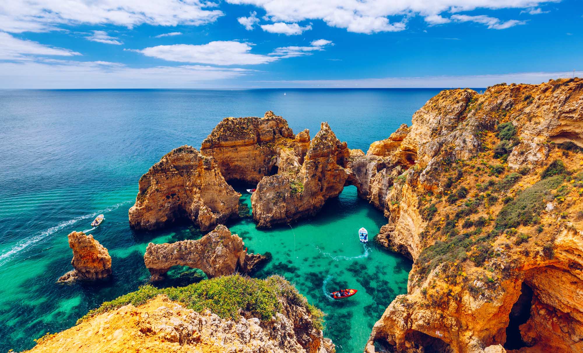 A stunning panoramic view of Ponta da Piedade near Lagos in Portugal's Algarve region, featuring