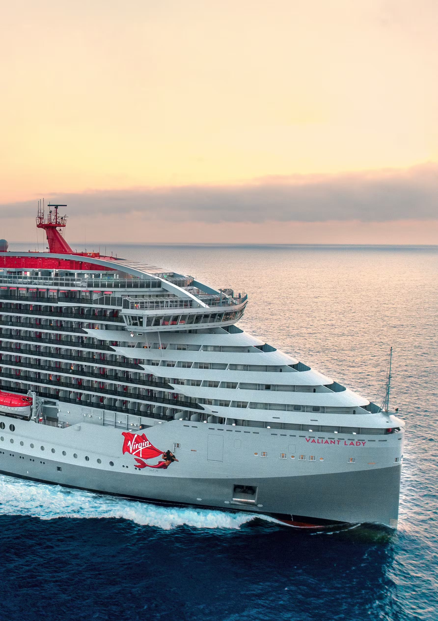 The Valiant Lady, a modern cruise ship operated by Virgin Voyages, is captured in striking detail