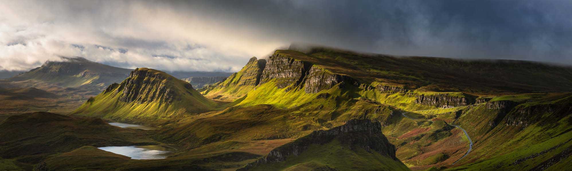 A breathtaking panoramic view of Iceland's rugged interior highlands, featuring distinctive layered