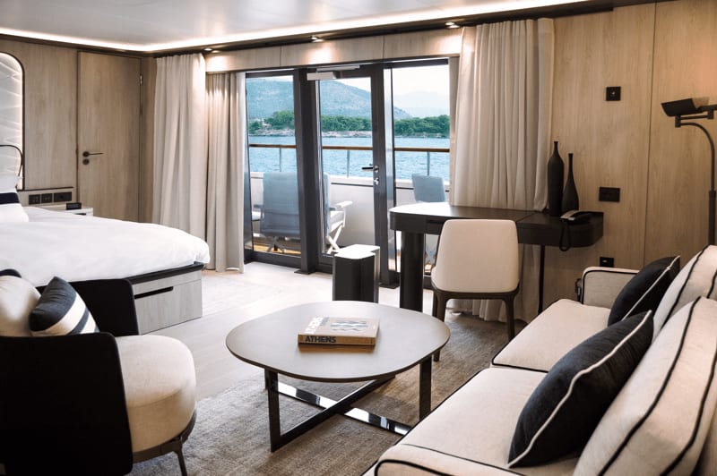 An elegantly appointed luxury suite aboard the Ponant expedition cruise ship Le Ponant, featuring