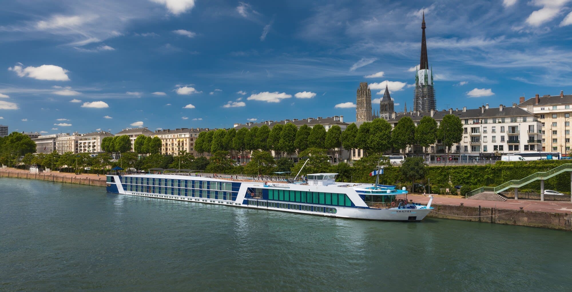 The AmaLyra, an AmaWaterways river cruise ship, is docked along the Seine River in Rouen, France