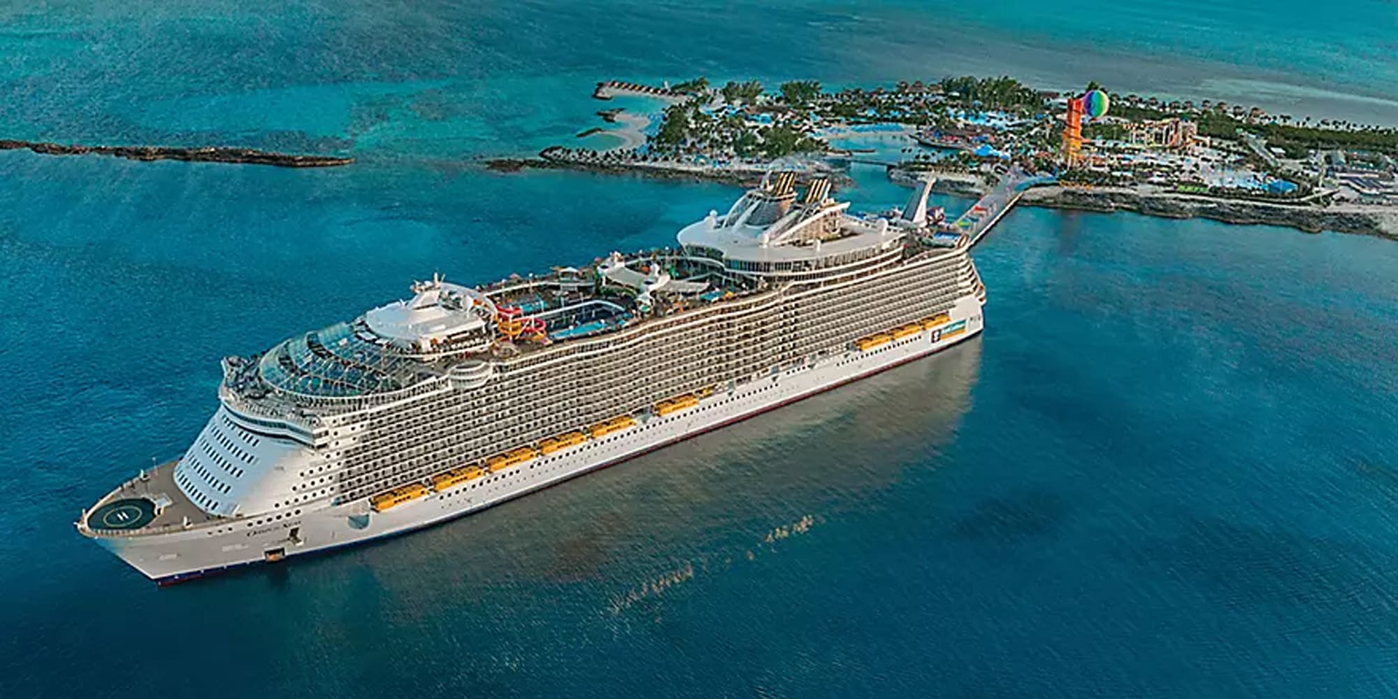 An aerial view of the Oasis of the Seas cruise ship anchored in the turquoise waters off Perfect