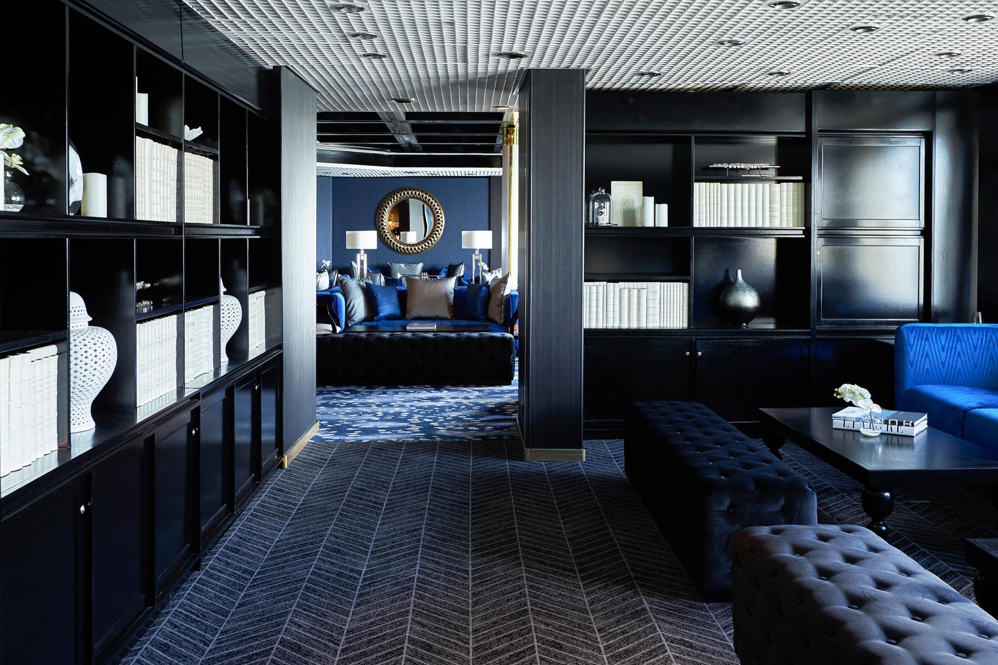 An elegantly designed modern lounge aboard a Celestyal Cruises vessel, featuring sophisticated