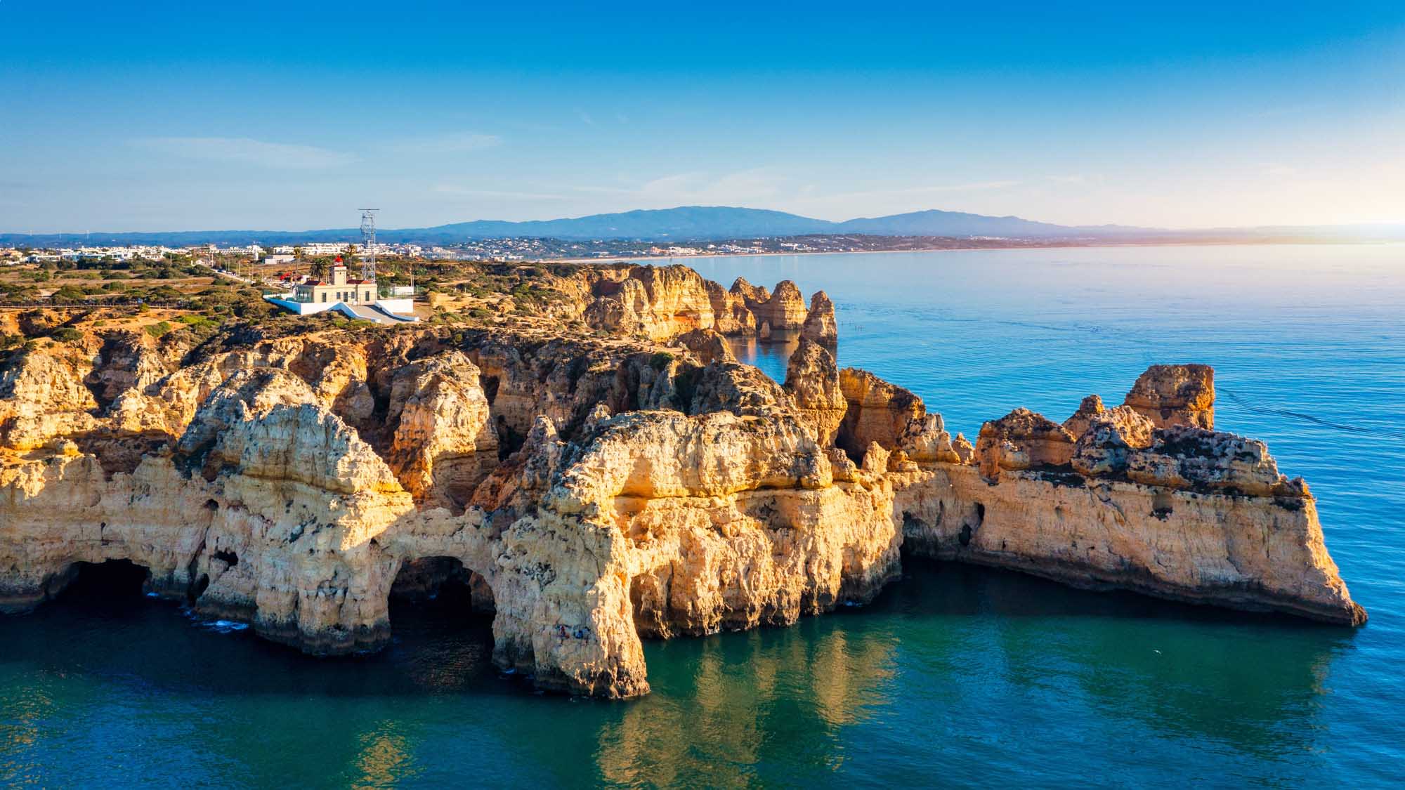 A stunning panoramic view of Ponta da Piedade near Lagos in Portugal's Algarve region, featuring