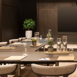 An elegant and sophisticated meeting room aboard The Ritz-Carlton Yacht Collection, featuring