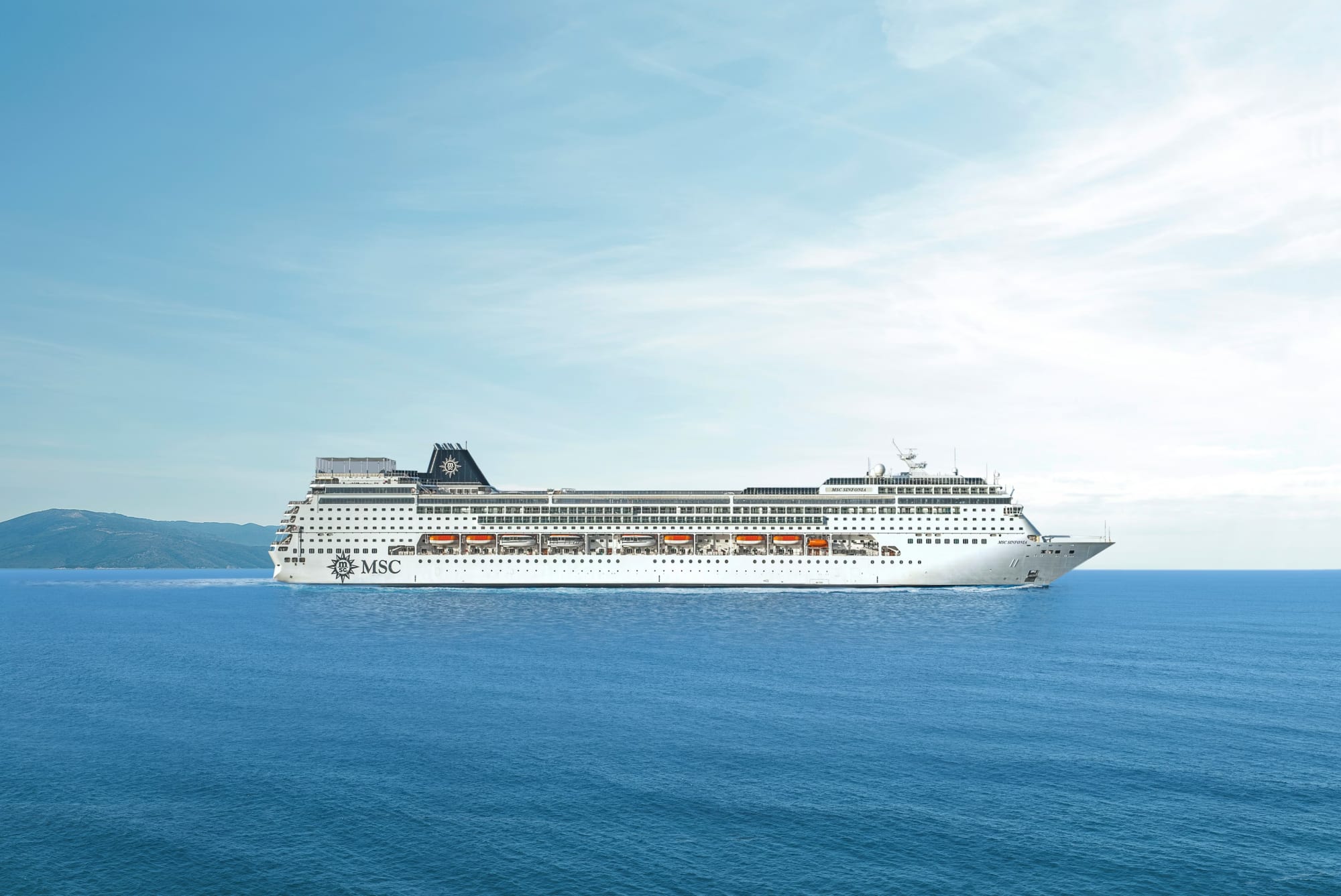 A large modern cruise ship operated by MSC Cruises, featuring a distinctive black funnel with