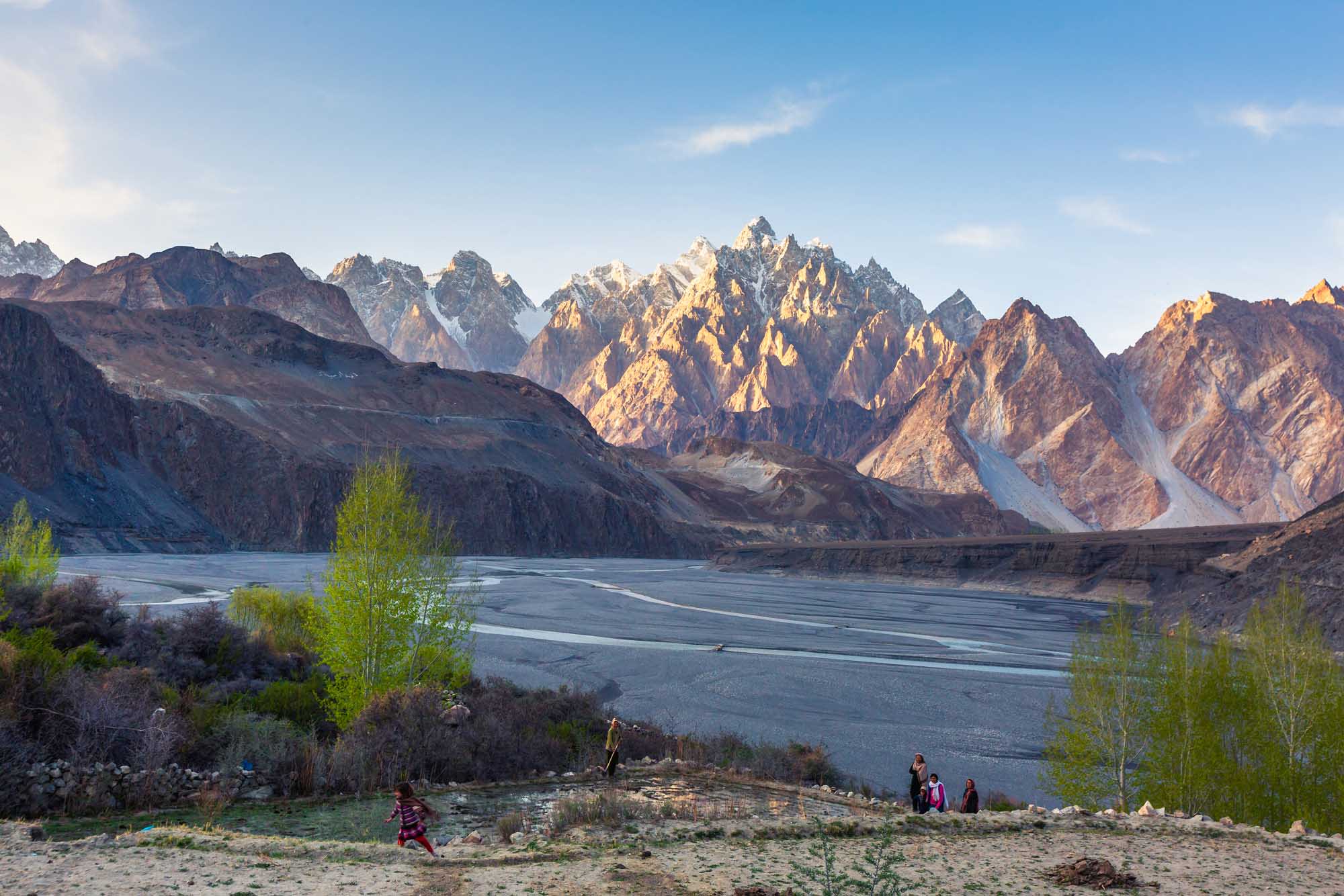 A dramatic panoramic view of Tupopdan mountain, also known as Passu Cones or Passu Cathedral