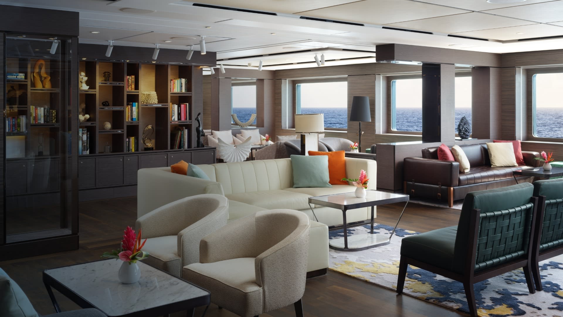 An elegantly appointed living room aboard a luxury yacht, featuring contemporary furnishings