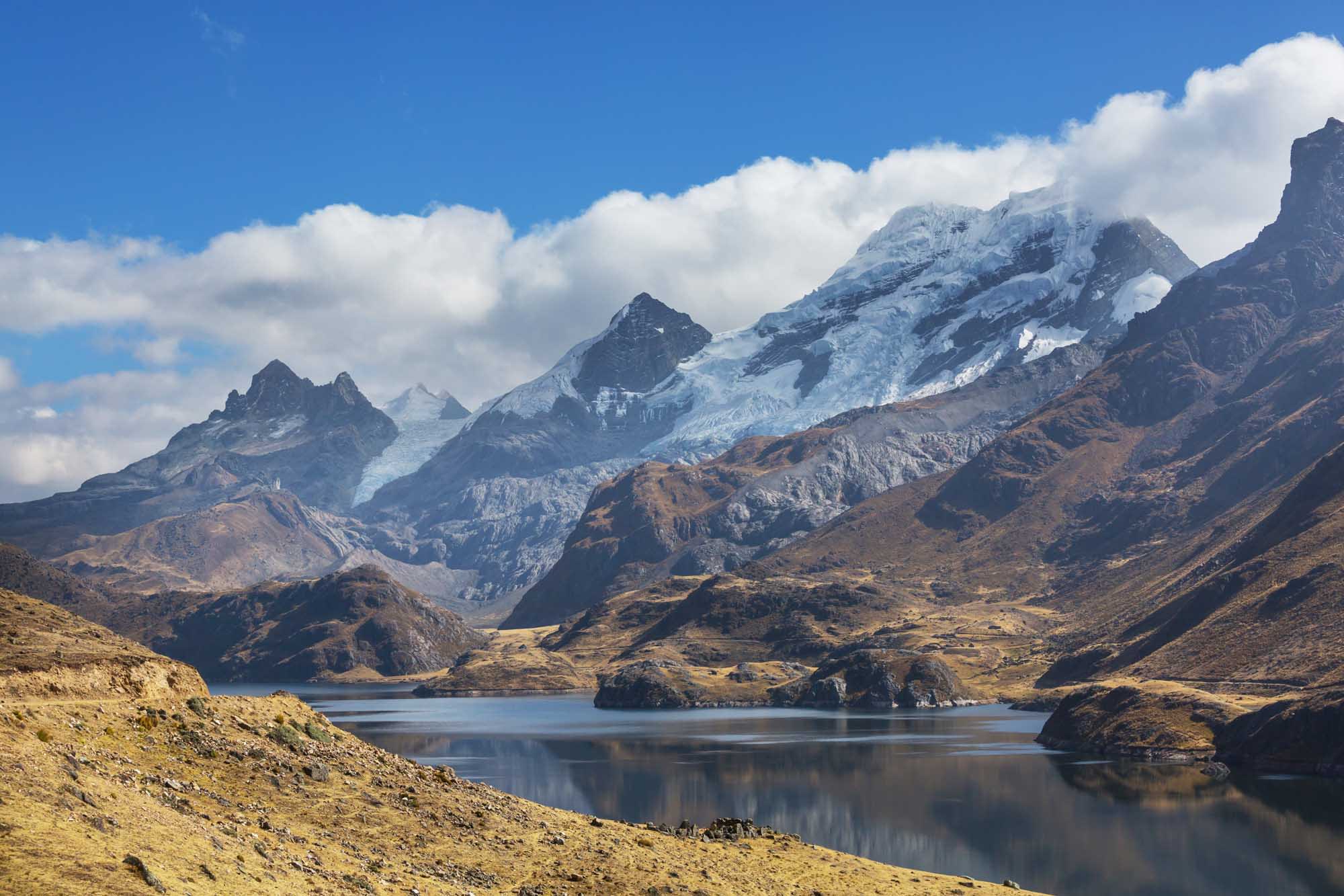 A stunning high-altitude alpine lake nestled in the Cordillera Blanca mountain range