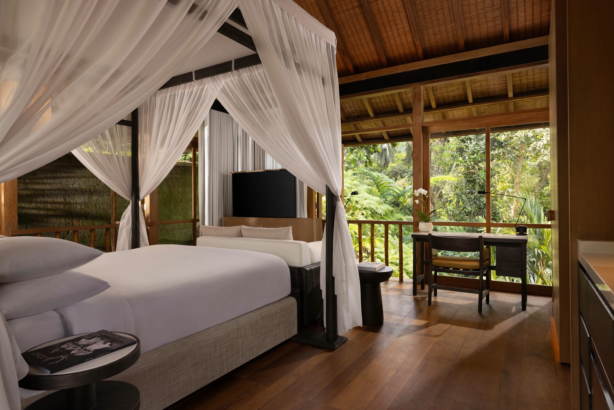 COMO Shambhala Estate Wanakasa Residence bedroom with natural materials and jungle views