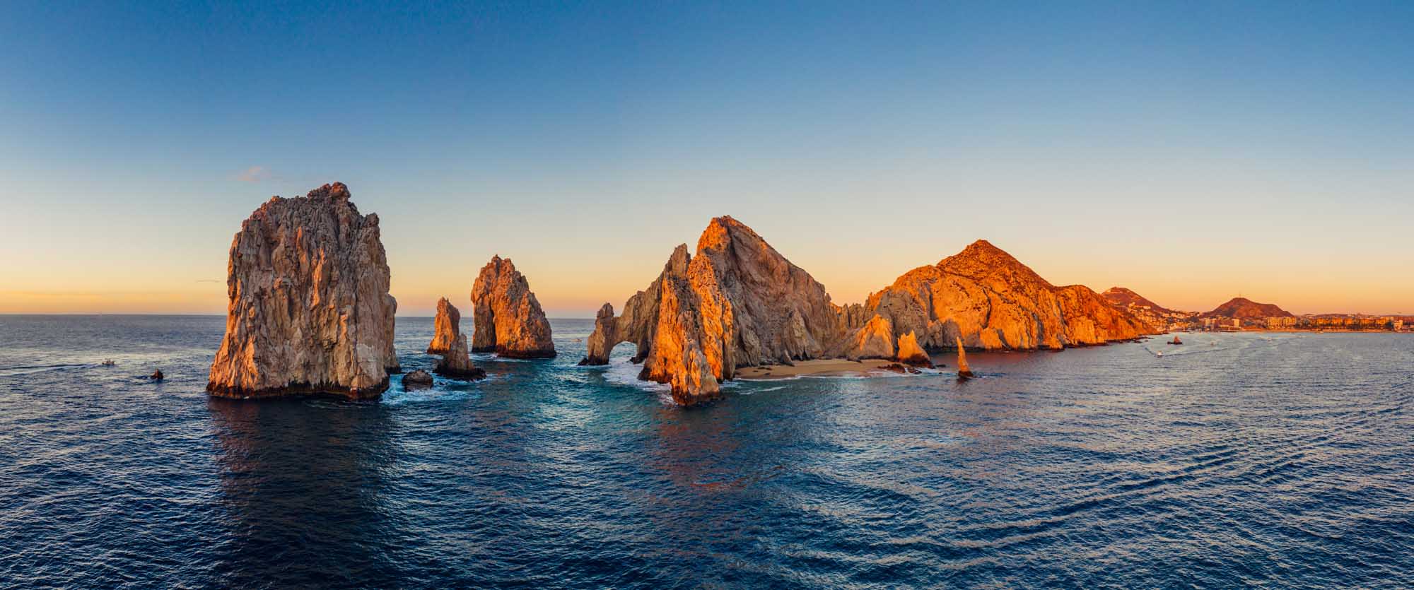 A stunning panoramic aerial view of the iconic El Arco (The Arch) rock formation at Cabo San Lucas