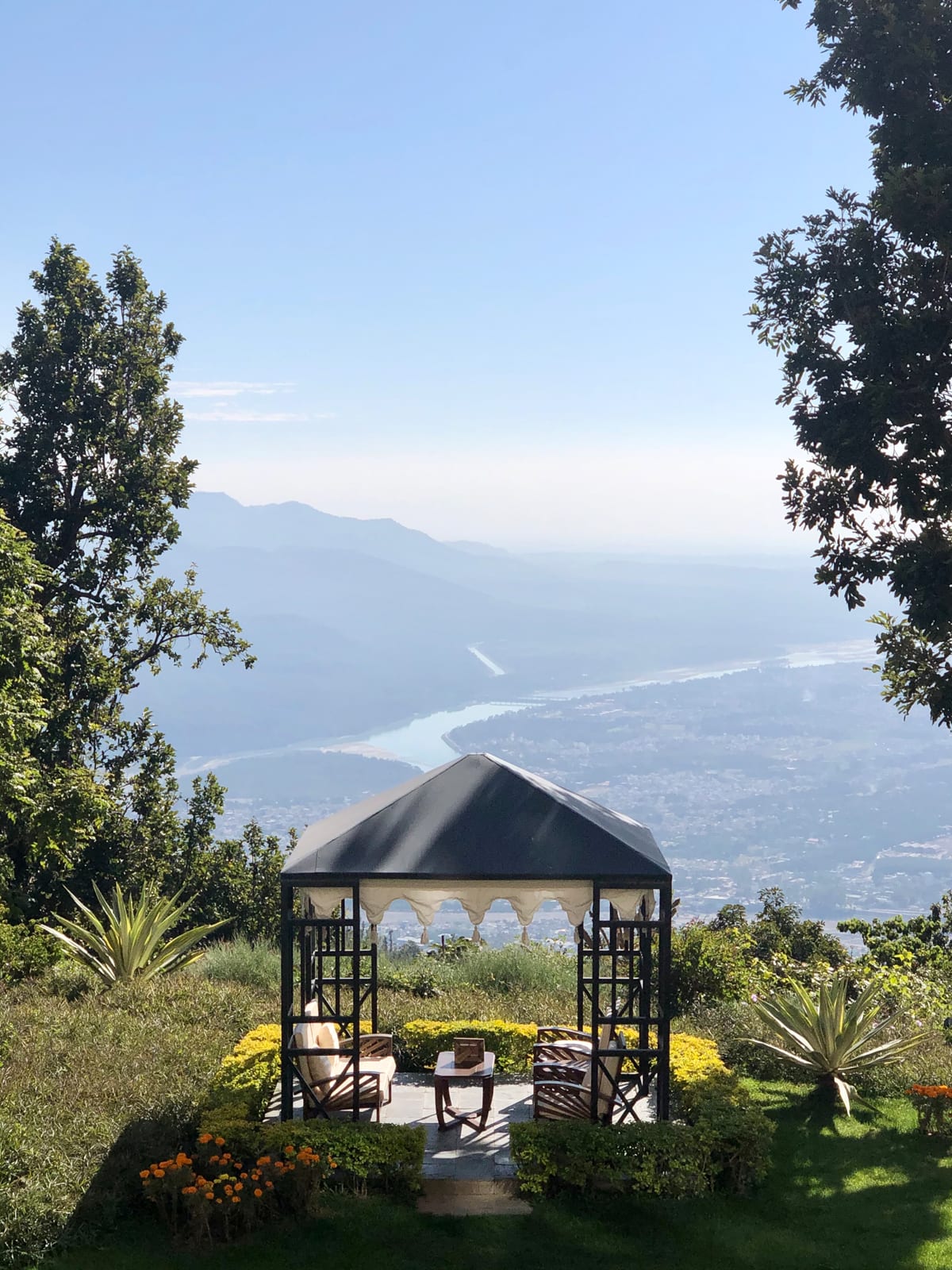 IMG_9931 Black gazebo with arched openings overlooking mountain valley and river below