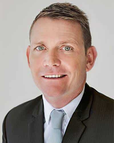 Professional Business Headshot of Corporate Executive in Suit Ross Quigly