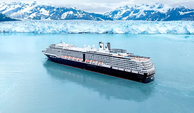 Cruise Ship in Alaskan Glacier Landscape Holland America cruise ship sailing through turquoise waters near Alaskan glaciers