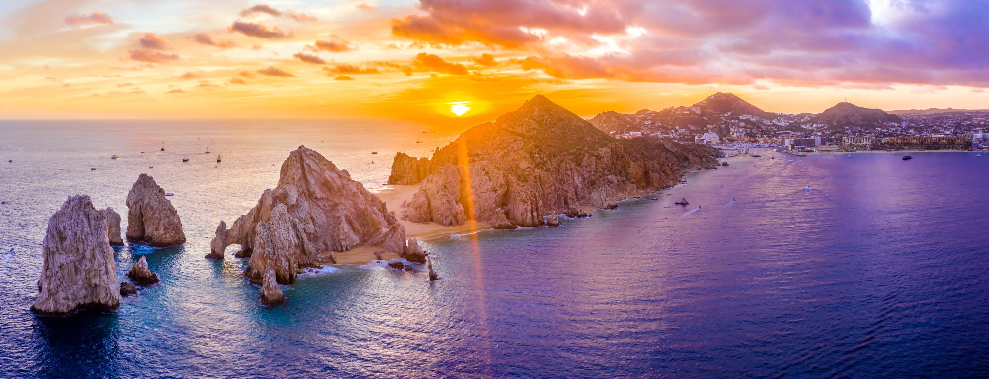 Desert landscape meeting the Sea of Cortez in Baja California with rugged mountains and crystal blue waters