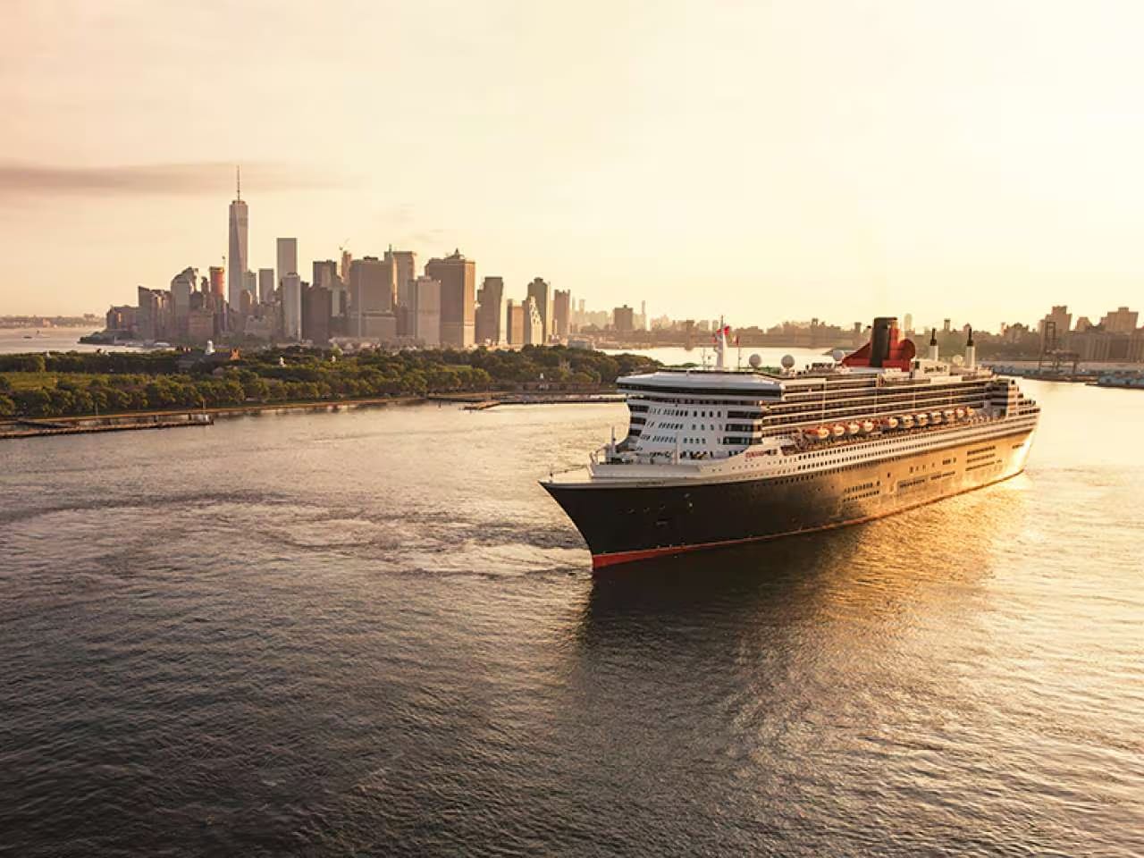 18385-qm2-new-york-750×563-mobile.jpg.1749736037874.image.1280.960.low Queen Anne cruise ship at sea